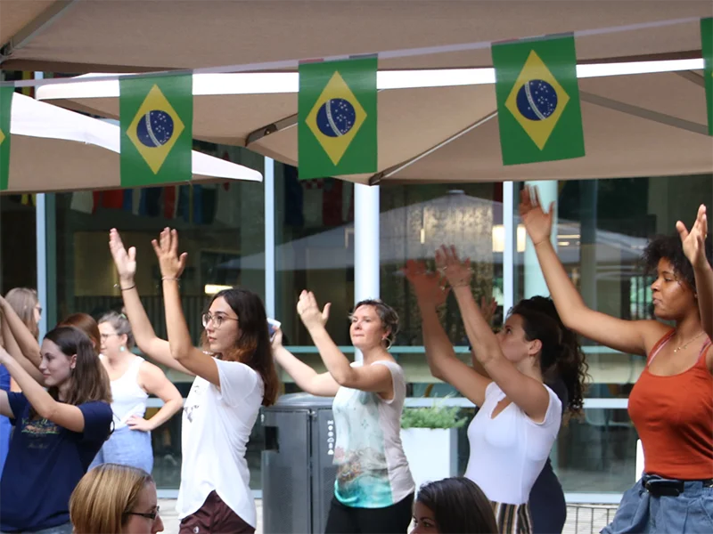 Megwen Loveless and students at the “PORtrait of Brazil” event