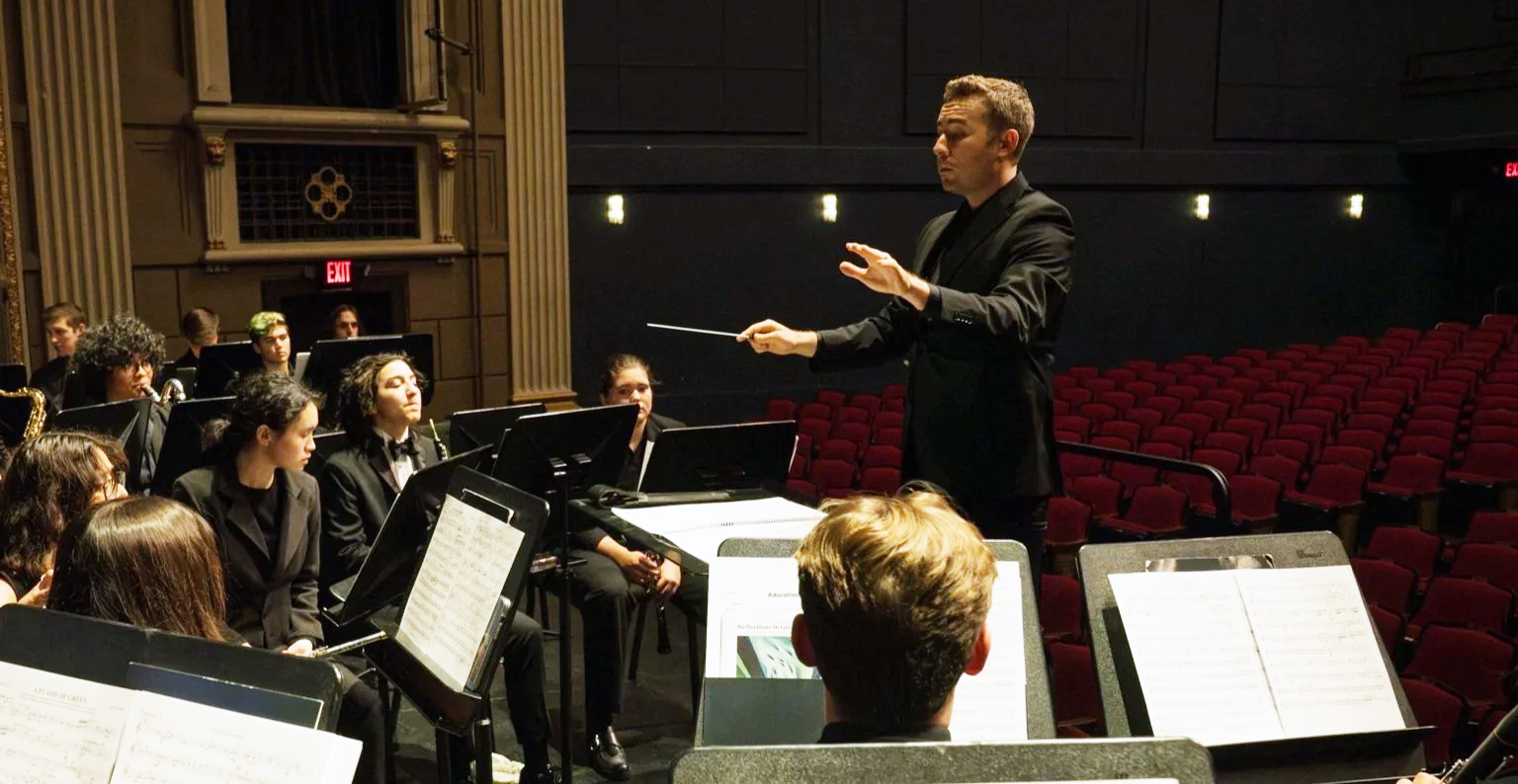 Dylan Parrilla-Koester conducts Tulane Concert Band 