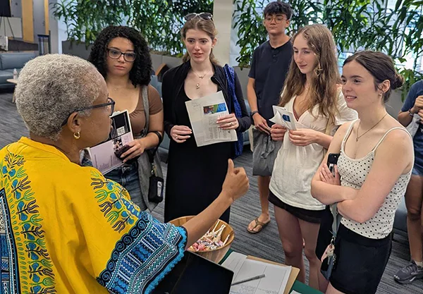 Laura Rosanne Adderley with students at the Tulane School of Liberal Arts Open House