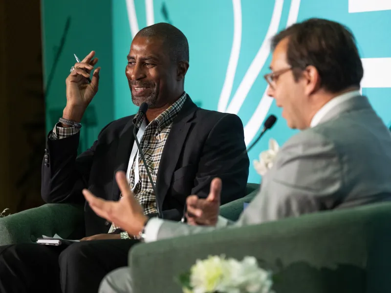 Gary Hoover discusses global energy governance with Frédéric G. Sourgens. Photo by Kenny Lass