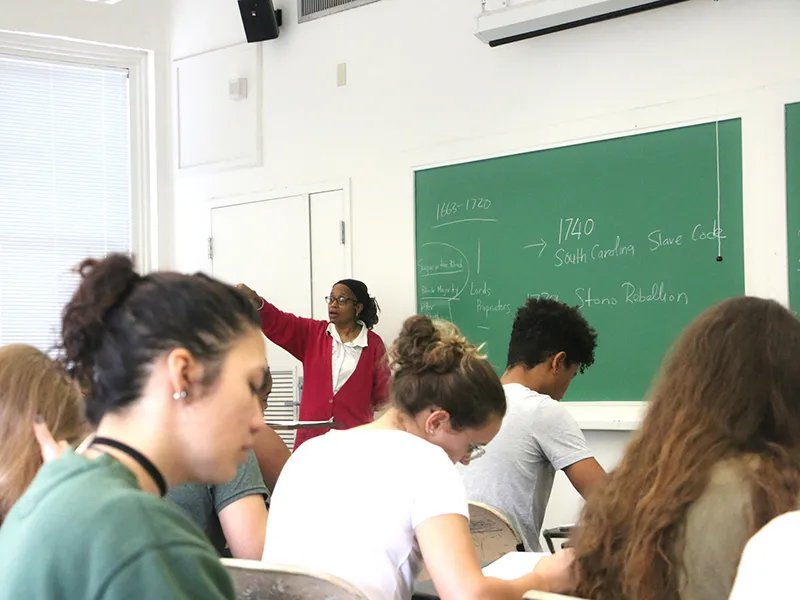 Laura Rosanne Adderley teaching a class of students